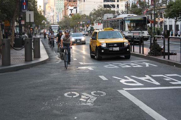 This bike lane on Market Street between 8th and 9th still hasn't been protected or painted green. Photo: Bryan Goebel.