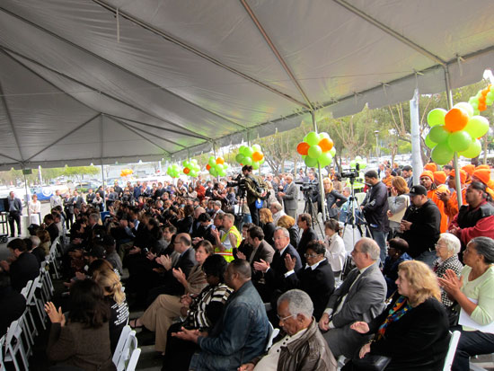 A large crowd attended the ceremony, including many from the building trades hoping to build the project.