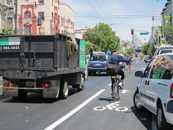 The Valencia Street bike lane on a normal sunny mid-afternoon. The hazards abound, but is it my responsibility to say something to careless cyclists? Photo: Matthew Roth