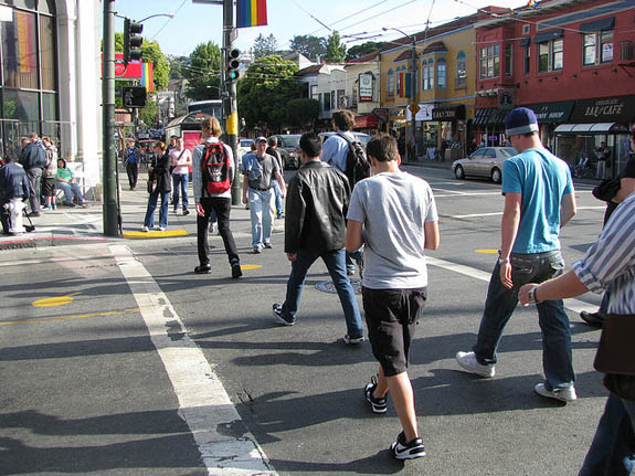 Pedestrians crowd one of the crosswalks on 18th Street at Castro. Wiener wants a pedestrian scramble installed at this intersection. Photo: Bryan Goebel