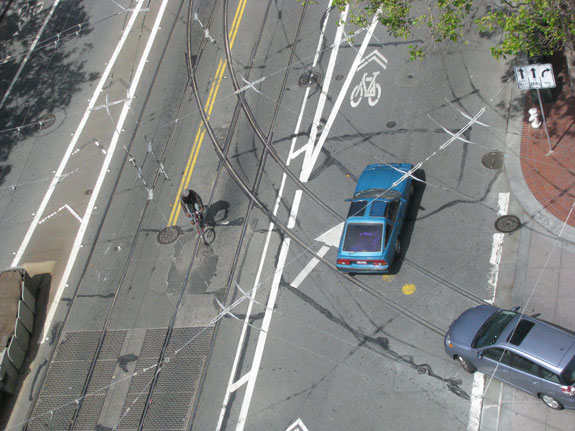 Westbound Market St. bicyclists who need to head down 11th Street will sometimes turn left and head over the tracks across Market St. to get there.