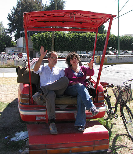 This back seat is a rest stop for bike and ped commuters crossing a long way from one side of the city to the other.