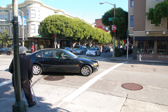 Crossing Hayes Street at Gough, where Eastbound vehicles must turn right. Photo: Aaron Bialick