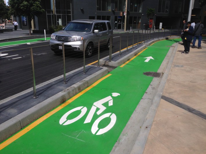 The protected contra-flow bike lane provides a critical connection between Market and Grove Streets. Photo: Stan Parkford.