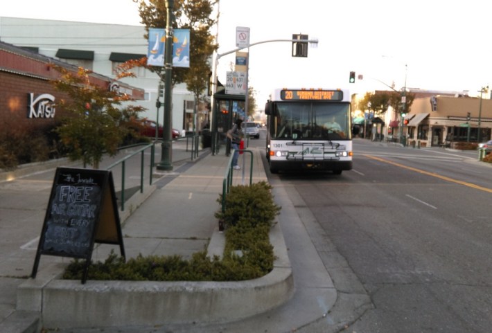 A permanent AC Transit bulb-out recently installed on Webster Street in Alameda. Photo: Aaron Bialick