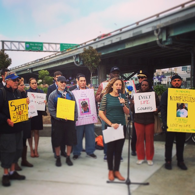 Walk SF Executive Director Nicole Ferrara speaks with safe streets advocates  near Fifth and Harrison, where Williams was run over in his sleep. Photo: Walk SF