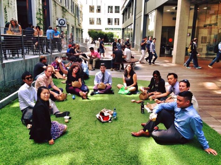 City transportation staffers enjoy the astroturfed plaza created on the Stevenson Street alley as part of the Twitter building's renovation. Photo: Jessica Kuo