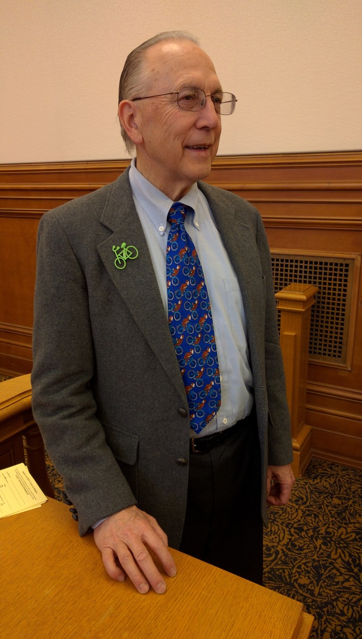 Bert Hill, chair of the committee, with his bike pin. Image: Streetsblog.