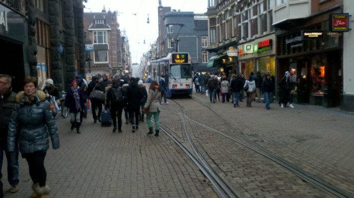 No parking lanes on this shopping street in Amsterdam. In fact, no lanes at all. And yet retail thrives. Photo: Streetsblog.