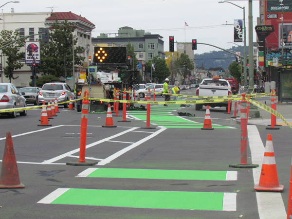 The lane markings are extended in some spots through the intersection.