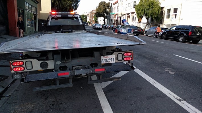 A buffered bike pane on the wiggle. Without concrete. Great place to park a tow truck! Photo: Streetsblog