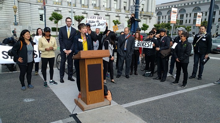 Margaret McCarthy, Interim Executive Director of the SF Bicycle Coalition, gives a rousing speech in front of SF City Hall. Photo: Streetsblog.