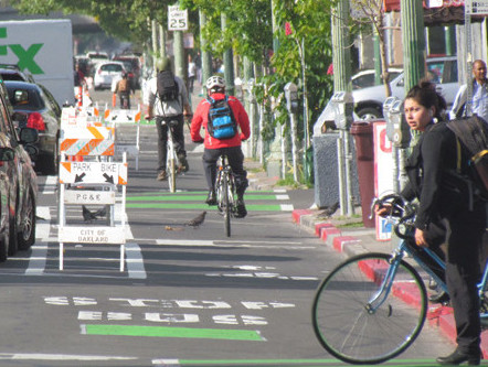 Park to the left, bike to the right. These signs are only temporary, but maybe the city should consider making them permanent. Photo: Melanie Curry/Streetsblog