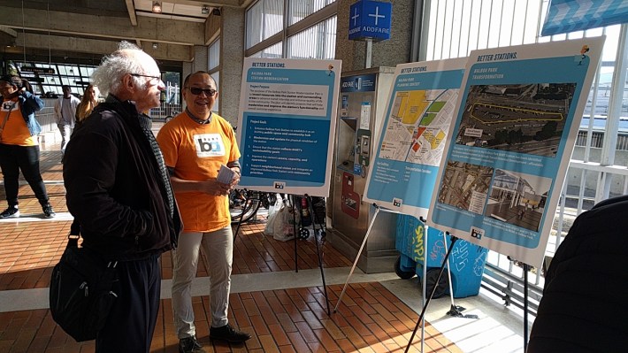 BART Planner Tim Chan explaining station plans and hearing comments from morning commuters at Balboa Park Station. Photo: Streetsblog.