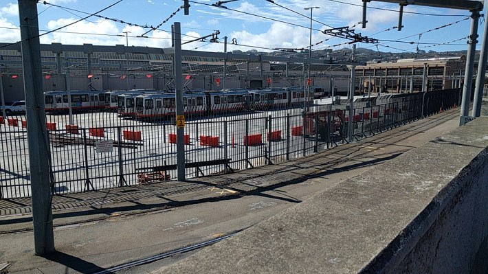 Muni's light rail facility takes up valuable real estate directly adjacent to the station. Photo: Streetsblog.