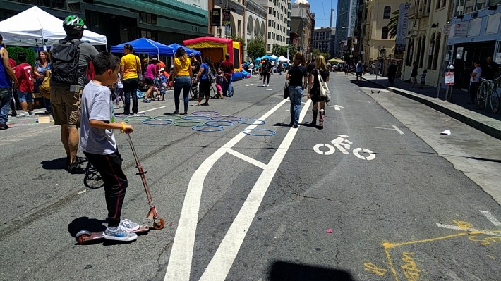 Block parties and other open streets events can bring long-term neighborhood change. So make them cheap to set up! Photo: Streetsblog.