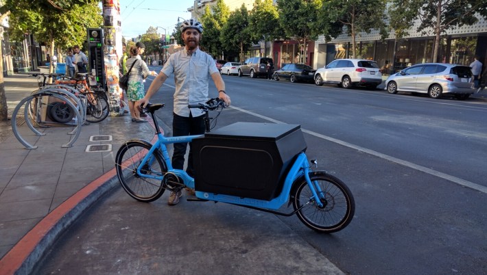 Ian Williamson, a sales rep for Revel Wine, says there are ways to make deliveries without blocking bike lanes--like on a bike! Photo: Streetsblog.