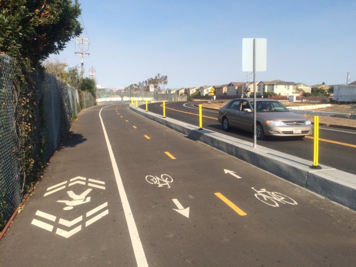 A 15-foot wide path marked for walking and bicycling is under construction on the north side of Chilco Street in Menlo Park. Photo: Andrew Boone