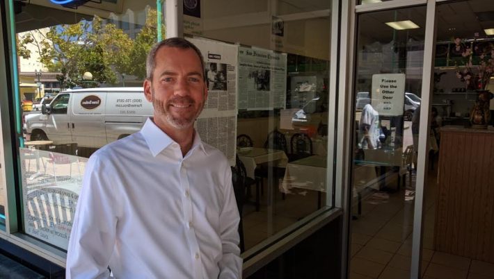 Jeffrey Tumlin, Principal and Director of Strategy at NelsonNygaard Consulting, outside a restaurant near Oakland City Hall. Photo: Streetsblog.