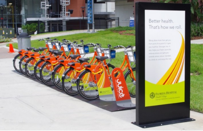 A SoBi bikes docking hub with large advertising panel. Photo: Social Bicycles