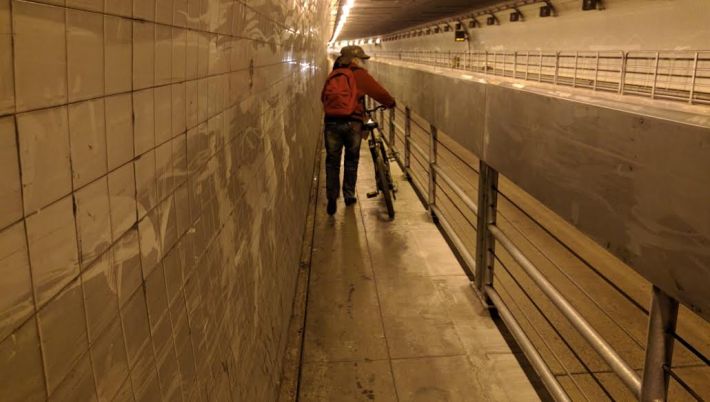 Streetsblog encountered only one other cyclist in the lonely hellscape of the "improved" tube. Photo: Streetsblog