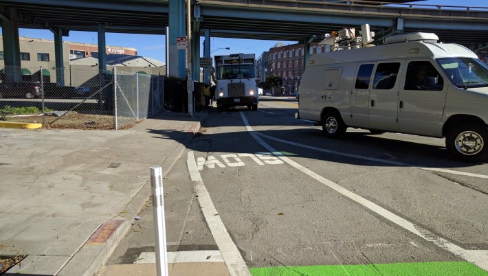 Of course, no new piece of SF bike infrastructure would be complete without a city vehicle blocking the bike lane that feeds into it. Photo: Streetsblog