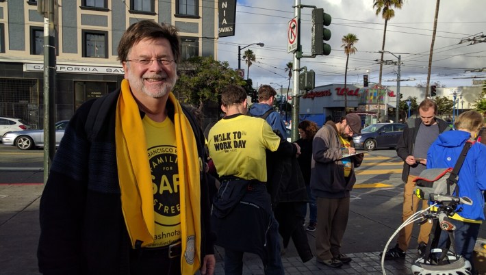 Michael Alexander talks with SFMTA's Kimberly Leung. Photo: Streetsblog