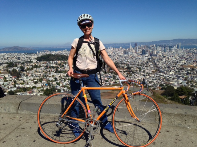Devon Warner, after a long climb, with one of her steeds. Photo: Devon Warner