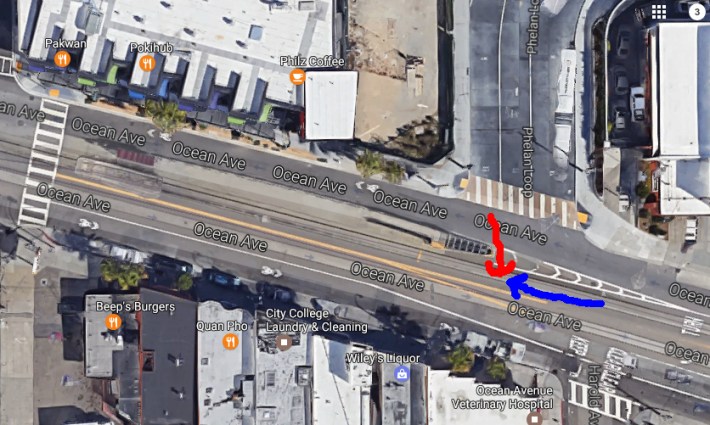 A rough approximation of the crash, with the pedestrian represented by the red arrow and the SUV by the blue. The impact propelled the pedestrian in the direction of travel of the SUV, before he landed on the streetcar tracks. Image: Google Maps