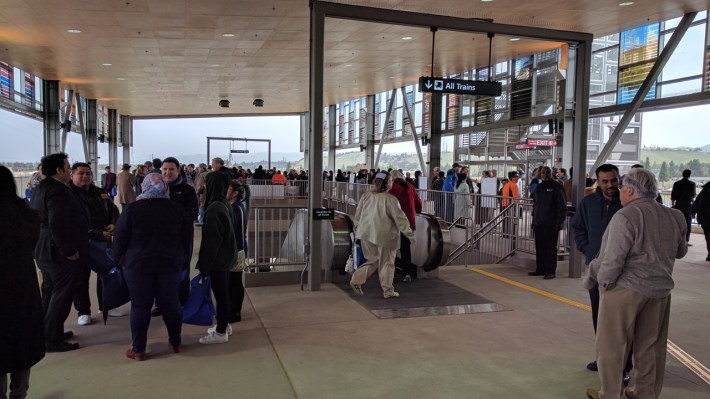 Crowds exploring the new station mezzanine. Photo: Streetsblog/Rudick