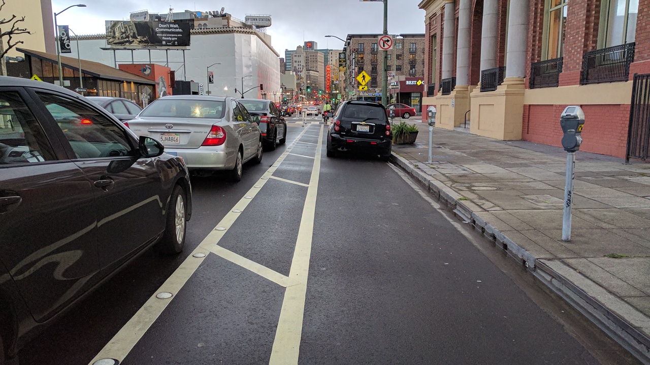 Telegraph's parking protected bike lane. Photo: Streetsblog/Rudick