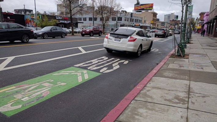 Bus/bike lane mixing zones have been problematic on Telegraph. This will be fixed with bus-boarding islands. Photo: Streetsblog/Rudick