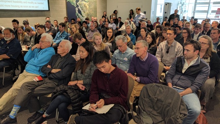 A packed house came to hear the experts talk about housing costs. Photo: Streetsblog/Rudick
