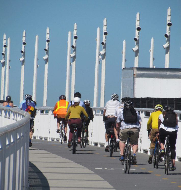 Riders headed up the ramp approaching the bridge from the east side. Photo: Streetsblog/Curry