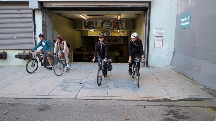 Riders emerging from the Sports Basement