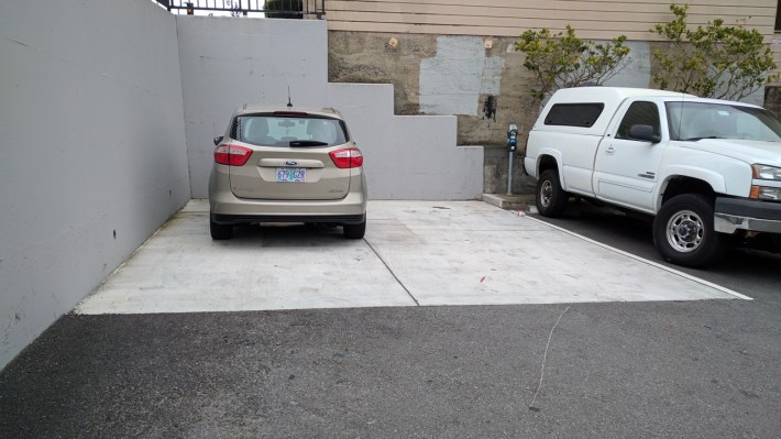Alas, the hidden bike lockers are removed to make room for one more car parking spot. Photo: Streetsblog/Rudick