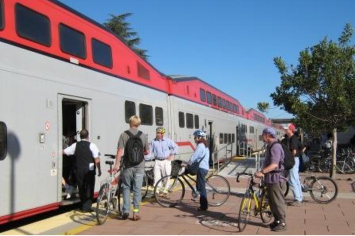 Cyclists unable to board a Caltrain before the BIKES ONboard campaign. Image from Johnson's presentation