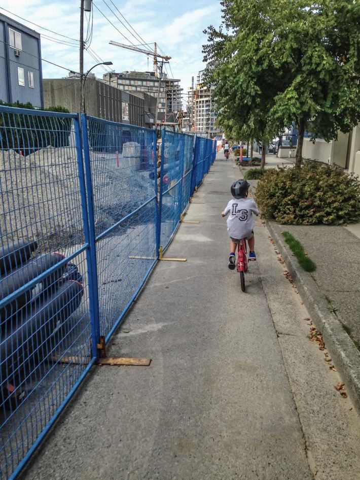A street in Vancouver, Canada. Despite the construction, safe accommodations are maintained for cycling. Photo: Chris Bruntlett