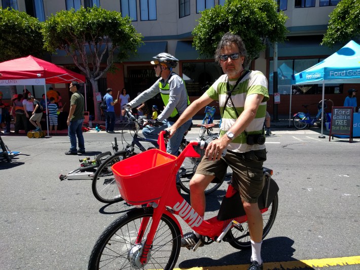 Bill McLeod, who has tried bikeshare in Paris, New York, and elsewhere, taking a Jump bike for a spin
