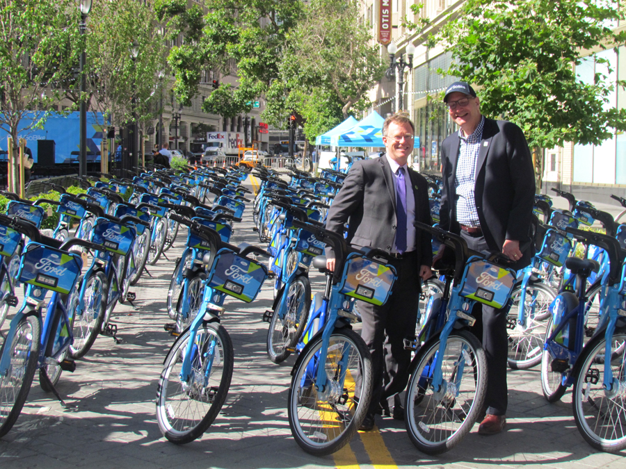 Oakland Transportation Policy Director Matt Nichols and Motivate CEO Jay Walder are ready to ride.