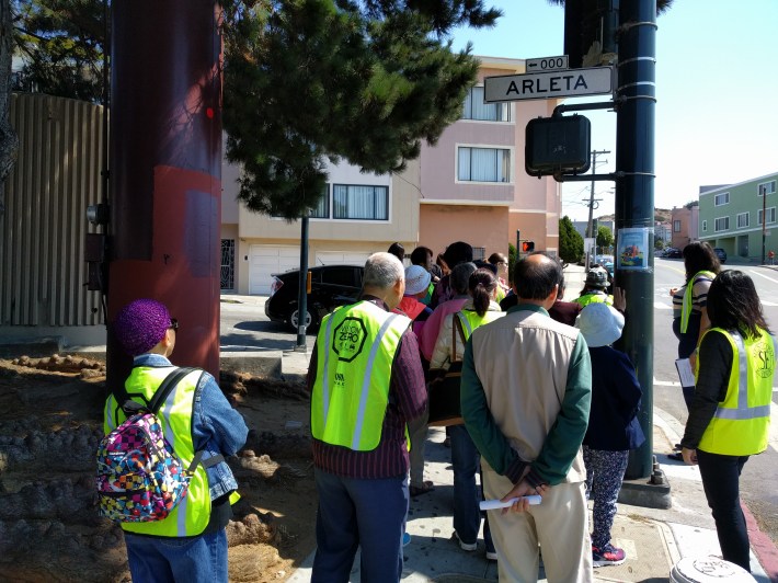 Narrow sidewalks with utilities and bus shelters make for cramped, uninviting places