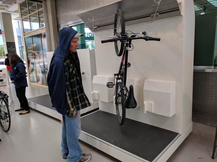 Many Caltrain customers were concerned that people wouldn't have the strength to lift bikes into this vertical hanger, even though it was the most space efficient