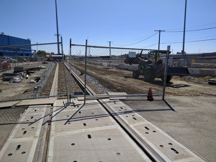 This storage track, nearing completion at BART's Oakland facility, will be used to store another work train. Photo: Streetsblog/Rudick