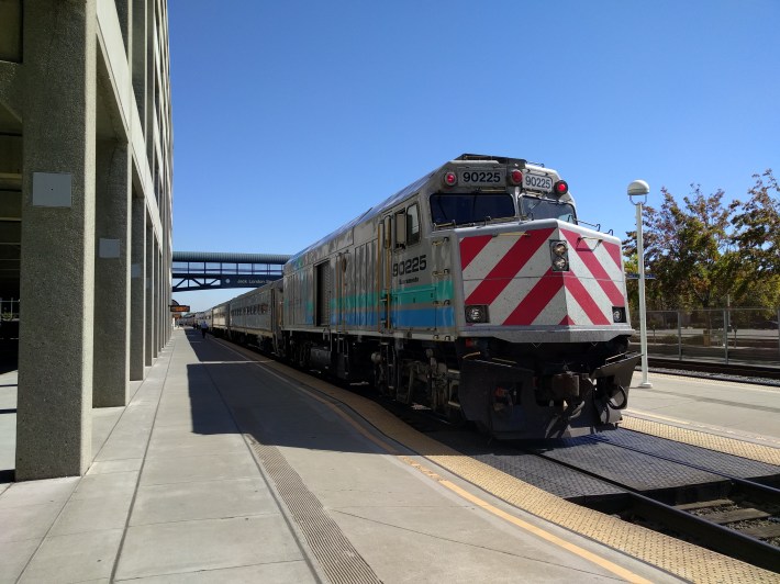 An Amtrak train waiting to depart for San Jose. Take Caltrain back on the opposite side of the Bay, and you get a whole different fare structure. Photo: Streetsblog/Rudick