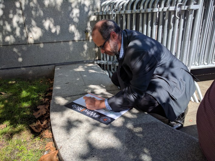 Edward D. Reiskin, Director of Transportation of the San Francisco Municipal Transportation Agency (SFMTA), filling out his "why I ride" card prior to the event. Photo: Streetsblog/Rudick