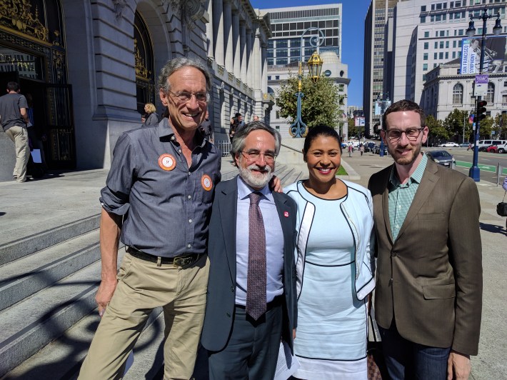 Peter Strauss of the SFTR's Board with Supervisors Aaron Peskin and London Breed, and Senator Scott Wiener. Photo: Streetsblog/Rudick