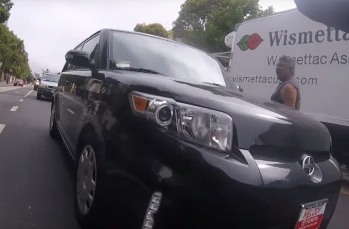 This man was captured on video threatening a cyclist. We need legislation so evidence like this can be used to suspend his license. Photo: SF Bikealot