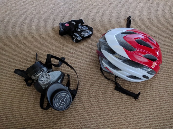 If you are going to ride, it's helpful to keep speed down, and add a NIOSH-certified mask to your kit
