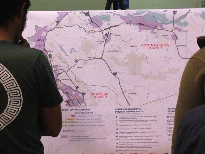 Attendees peruse a map of proposed projects in Contra Costa County