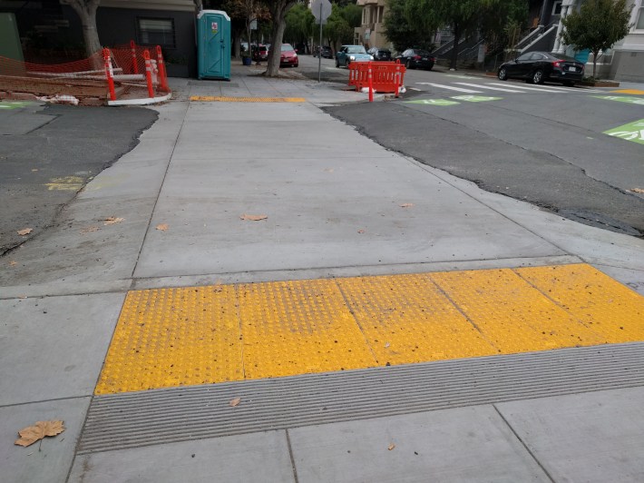 Buld outs, raised sidewalks and other safety measures seem to be finally improving safety in SF. Photo Streetsblog/Rudick